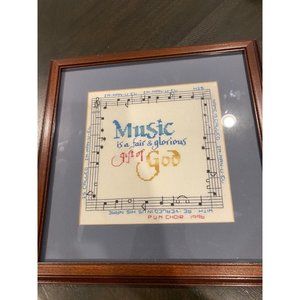 Needlepoint handmade and desgned in frame with glass